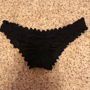 black ruffled bottoms. small.
